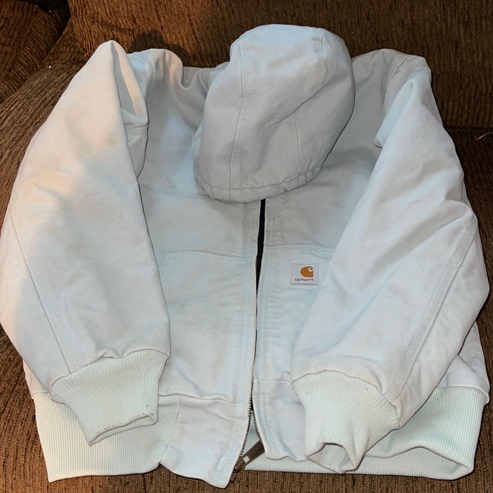 Carhartt coat- good condition. One small tiny stain on back